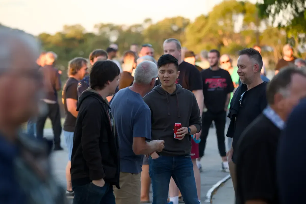 Men talking together outside at OneHope