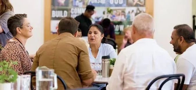 People sitting together over coffee after church